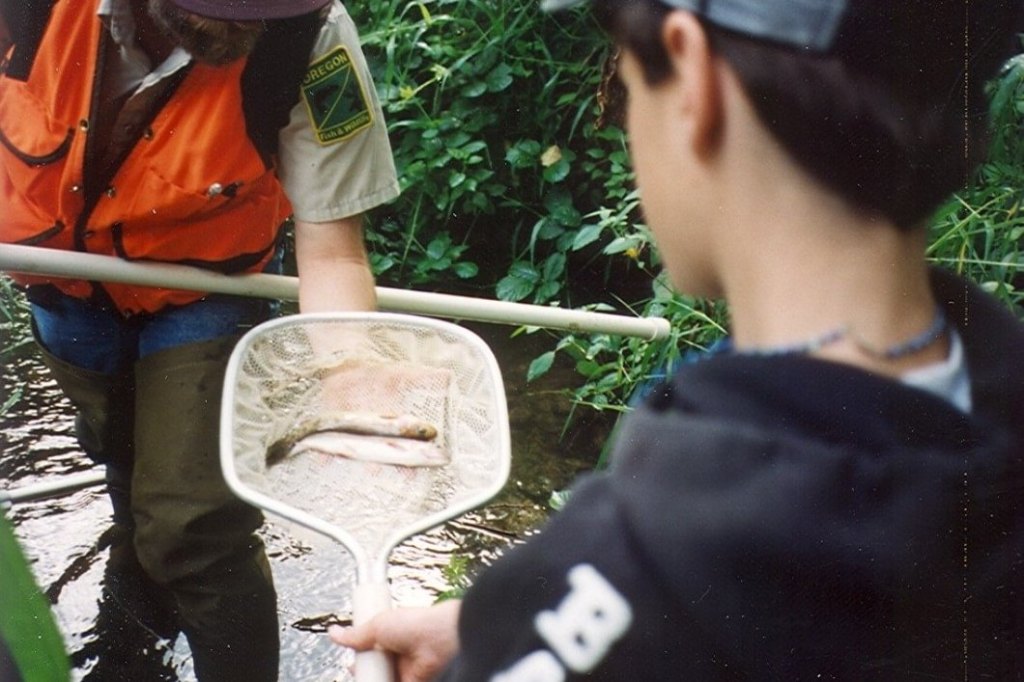 student assists ODFW biologist salmon fox creek rainier columbia county oregon